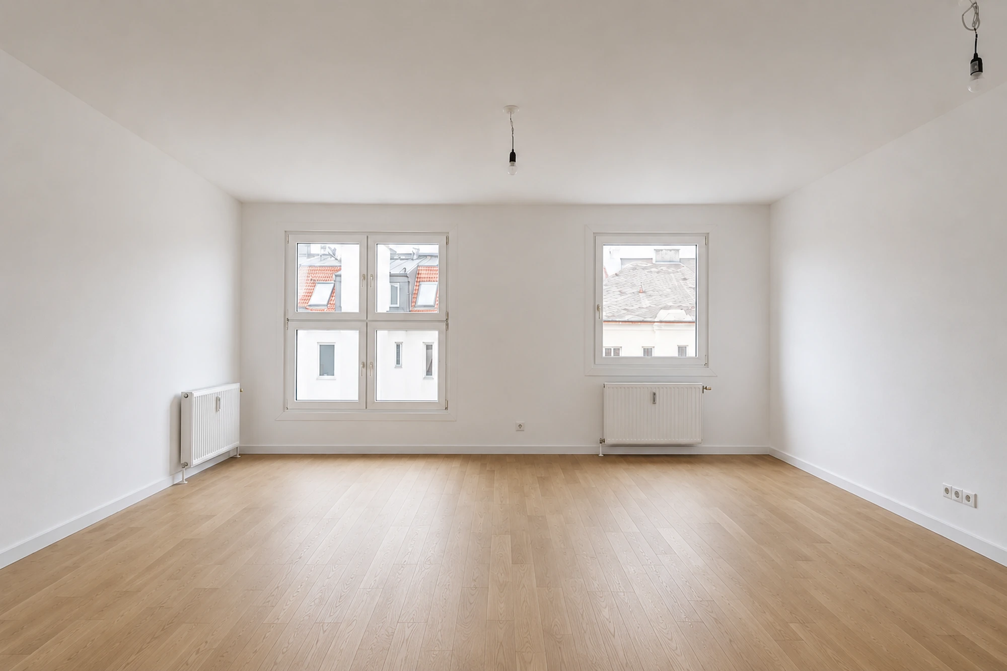 Frontaler Wohnraum einer umfassend sanierten Wohnung in Wien